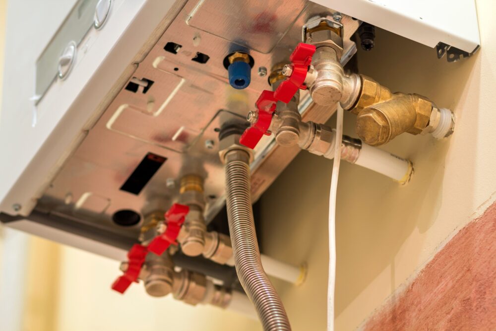 Gas water heater boiler for home heating, bottom view.